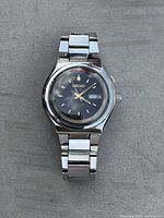 Front view of Seiko Bell-Matic watch showing full bracelet