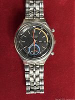 Front view of Seiko chronograph showing dial, hands, bracelet