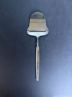 Full view of Georg Jensen cheese slicer front
