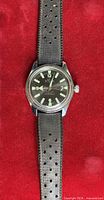 Front view of Bifora watch on strap, bezel area visible
