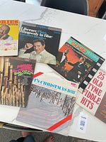 All six LP covers spread on table