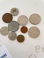 Group shot of all ten coins laid out