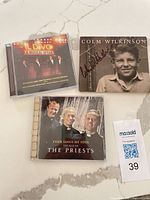 All three CD cases front covers visible