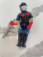 Front view of Cobra Viper figure with rifle accessory
