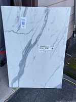 Full view of marble-look laminate countertop leaning upright
