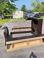 All bed components laid out: headboard, footboard, side rails, drawer unit, slats