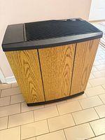 Full view of Bemis humidifier showing wood-grain cabinet