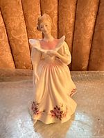 Front view of Royal Doulton June figurine