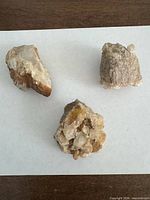Top view showing three quartz pieces on white background
