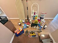 Overall lot with ironing board, step ladder, mop, chemicals and tools
