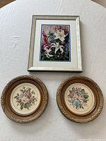 Group shot showing all three framed floral pieces