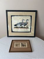 Both framed artworks side by side