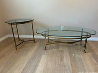 Oval coffee table and round side table showing overall form