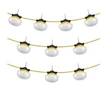 Three rows of yellow-cable string lights with white globes