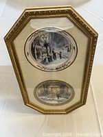 Front view of framed display showing both plates