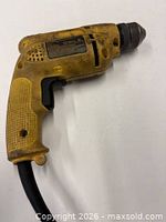 Left-side view of DeWalt D21009 corded drill