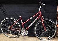 Full left side view of Diamondback hybrid bike shows frame, wheels, drivetrain