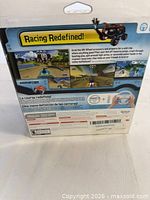 Back of the box displaying screenshots, NTSC info and feature details