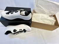 Pair of new fi'zi:k Tempo Overcurve R5 cycling shoes with box and tissue visible