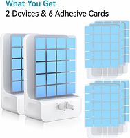 two fly trap devices with six adhesive cards