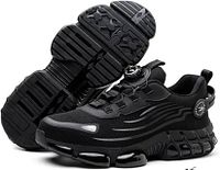 Oblique view pair of black K-9 safety sneakers showing upper and sole details