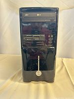 Front view of black mid-tower case with LG DVD-RW drive, card reader, USB and audio jacks