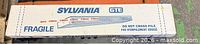 Sealed box labeled Sylvania GTE fragility warning