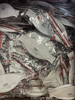 Box filled with individually wrapped 3M Aura 1870 masks
