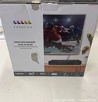 Front of boxed Proscan PDVD6655-B DVD player showing product image and branding