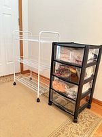 Wire cart and plastic drawer unit side by side