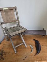 overall lot showing chair, shelf, two crescent moons