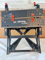 Overall view of folded Workmate 225 with clamp blocks inserted
