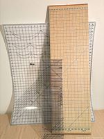 cardboard design mat, PVC mat, acrylic ruler stacked for scale