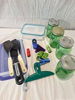 Group shot of all items: jars, utensils, containers, bag clips