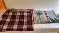 Both throws laid flat for size, color, pattern overview