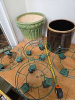 Overview showing both planters, four dollies, tape measure