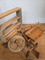 All items group shot: wooden jewelry box, shelf, foldable stand, cork tray/coasters, peg rack