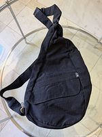 Front view of AmeriBag sling showing overall shape, strap and front flap pocket