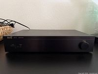 Front view of NHT MA-1A amplifier showing overall unit