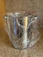 cooker/steamer wrapped in plastic