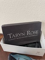 Taryn Rose shoe box with visible interior packaging
