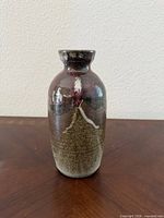 Full front view of ceramic vase showing color transitions and shape