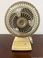 Front view showing full fan and base