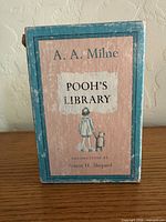 Front of slipcase showing title panel and wear