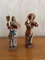 Front view of both figurines showing size and details