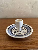 Top angled view showing entire candlestick holder with design