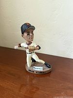 Front view of Omar Vizquel bobblehead showing pose, uniform, and base text