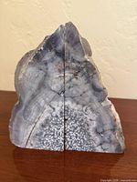 Front view of agate bookends showing polished faces and crystal formations