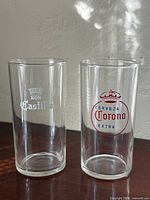 Front view of both branded highball glasses