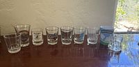 All eight shot glasses lined up on table